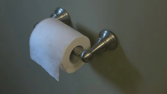 Self adhesive toilet paper